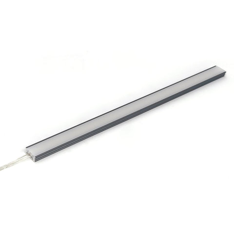 Simple Lighting - Lighteez 2m Surface LED Profile - Wide surface LED profile on a white surface with an attached cable on one end.