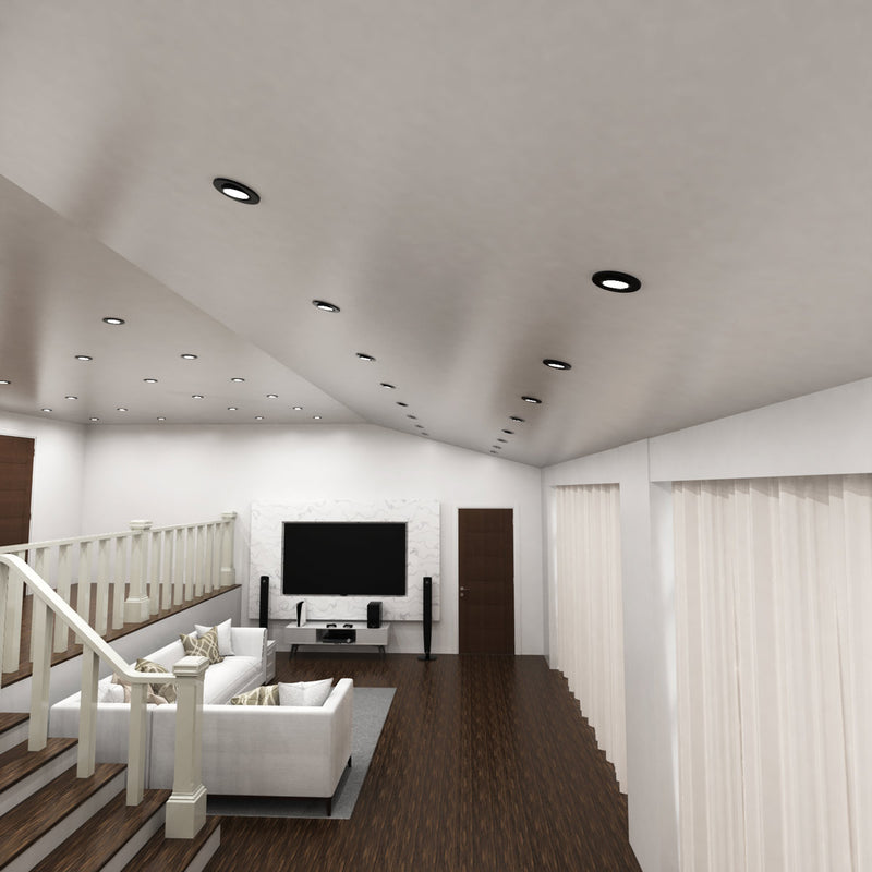 living room with mounted black fire-rated downlights