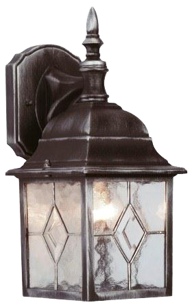 An image of a back and silver lantern with a warm glow on a white background.