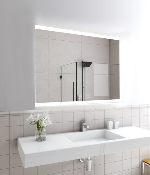 Full shot of a bathroom mirror with LED lights at the top and bottom edge