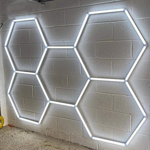 24 LED tube lights in a hexagonal design mounted on the wall