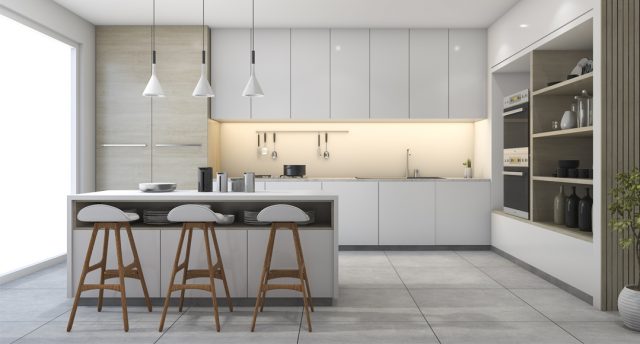 modern kitchen with three pendant lights and white cabinets