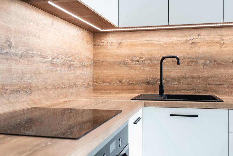 kitchen counter with under cabinet light in natural white light