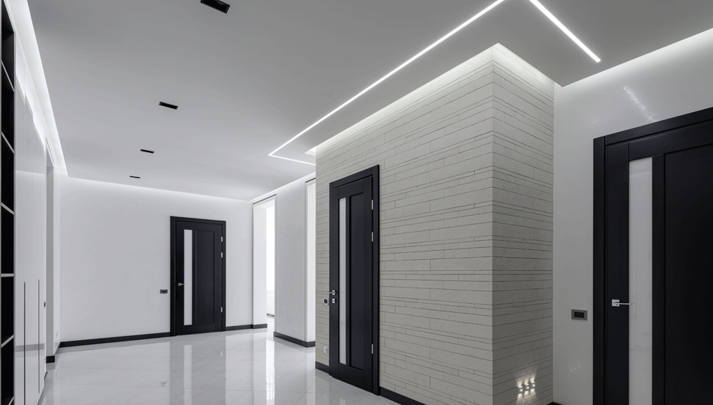 white hallway with cool white LED strips on the ceiling