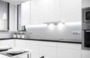 white dominant kitchen with under cabinet lights in cool white light