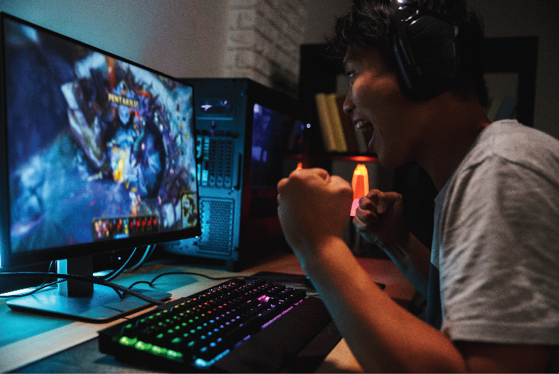 Gamer Playing in a Room with Dual White LED Strip