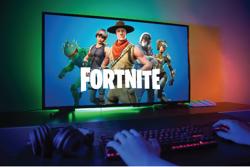 Room with RGB LED Strip Gamer Playing Fortnite