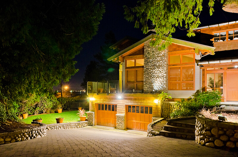 brown house with wall lights