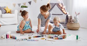 mom, daughter, and son, playing