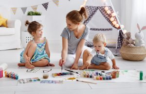 mom, daughter, and son, playing