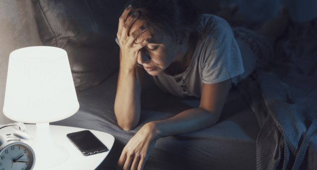 Girl who woke up next to a night lamp