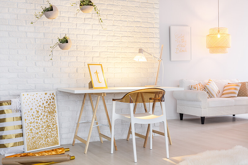 white desk with white desk lamp and white chair