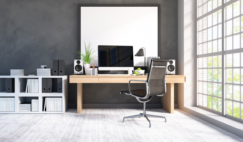 home office with black chair and computer monitor