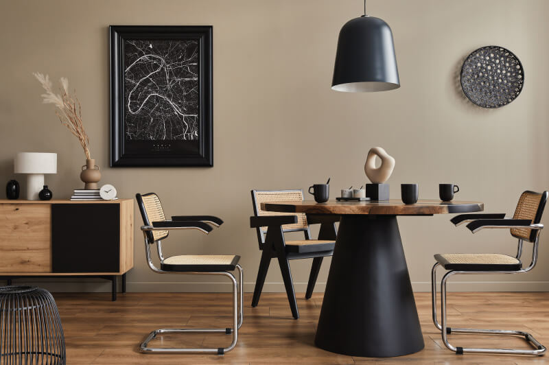 dining table with a black pendant lamp