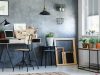 room with a wooden chair and black pendant lamp