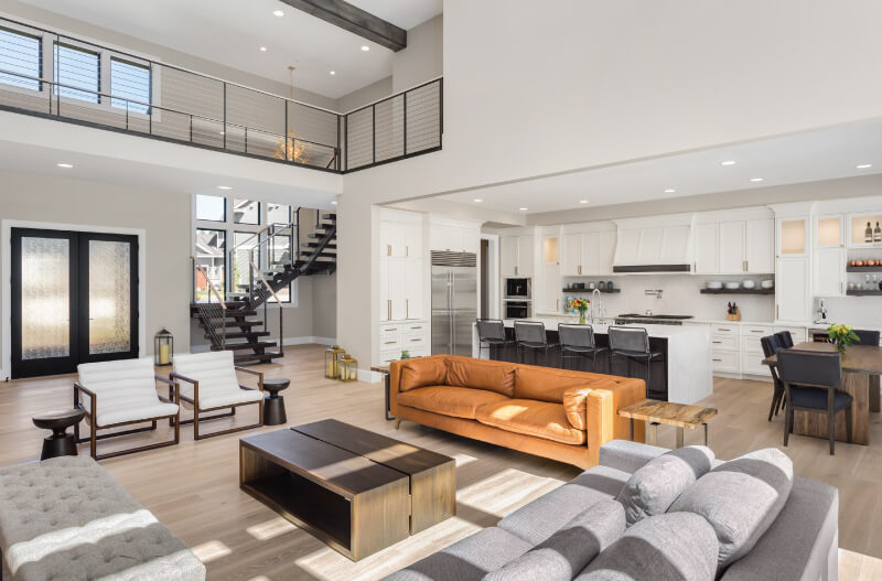 living room with brown and grey couches