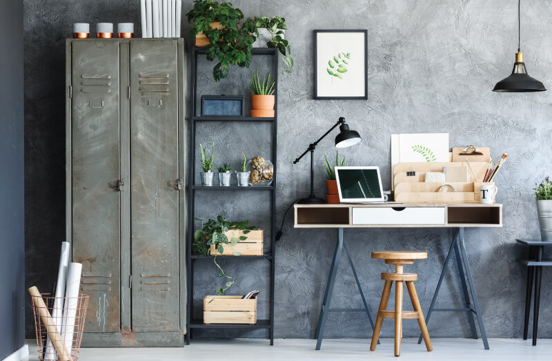 study desk with a shelf and plants