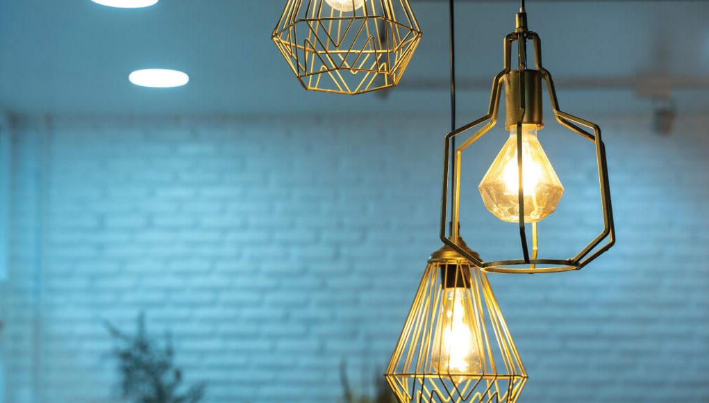 two pendant lamps with metal frame