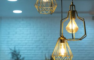 two pendant lamps with metal frame