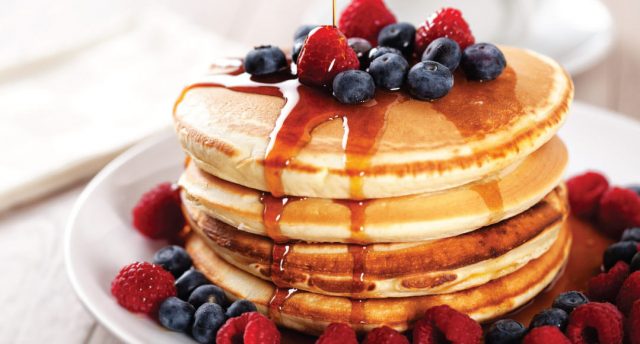 pancakes topped with berries