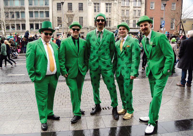 5 guys wearing a green suit with green hat