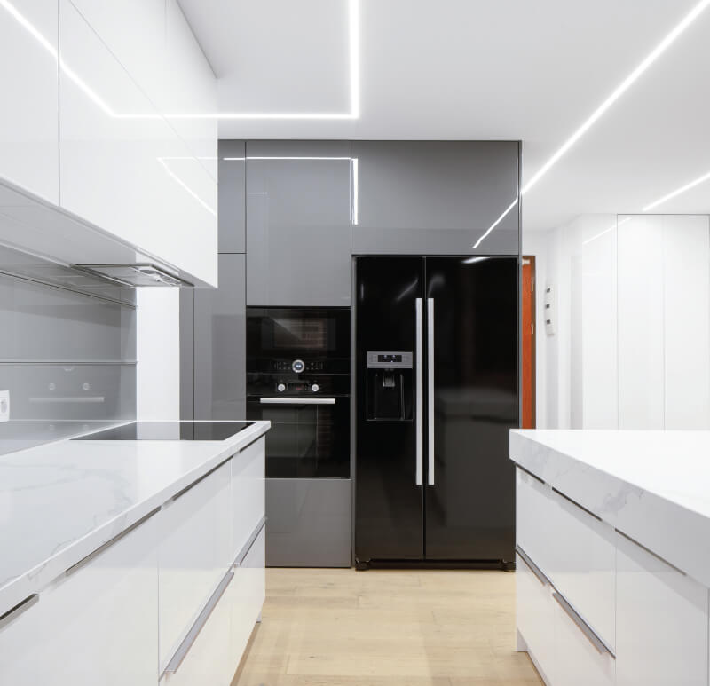 modern kitchen with a black fridge