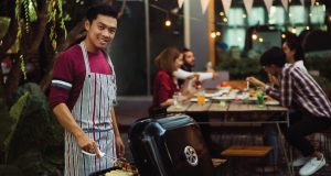 man grilling