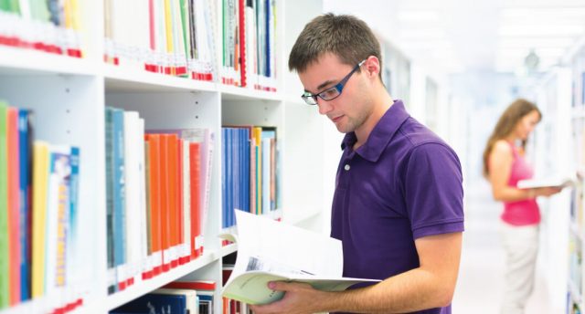 man reading a book