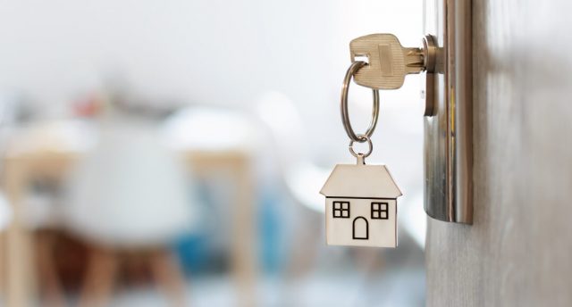 key with a house keychain