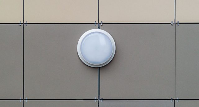 white bulkhead light on a wall