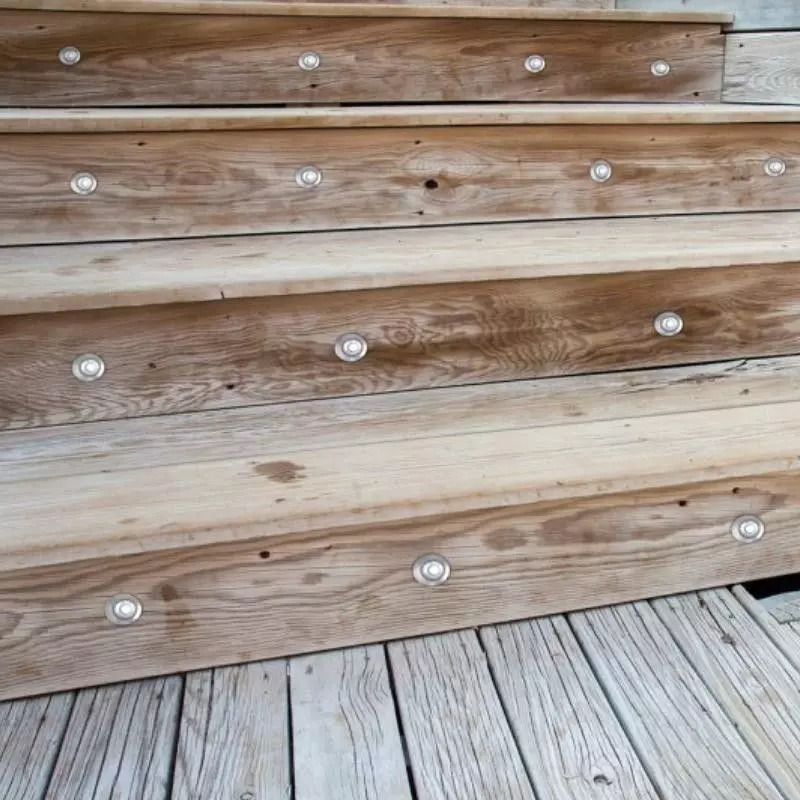 wood stairs with plinth lights