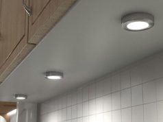 surface mounted under cabinet lights beneath a kitchen cabinet