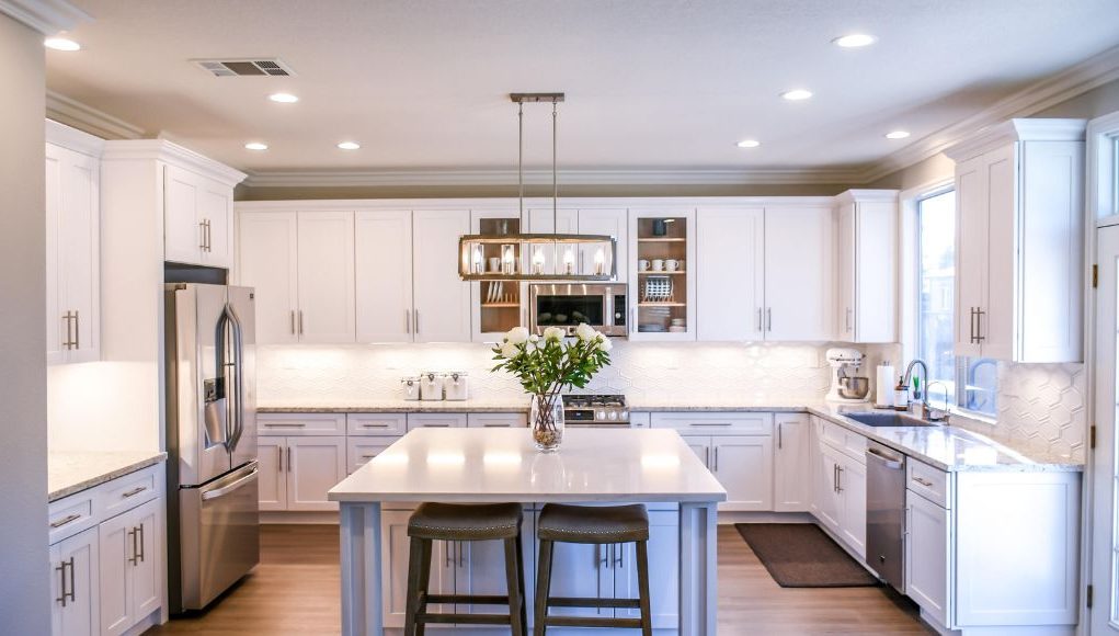 kitchen with white dominant interior
