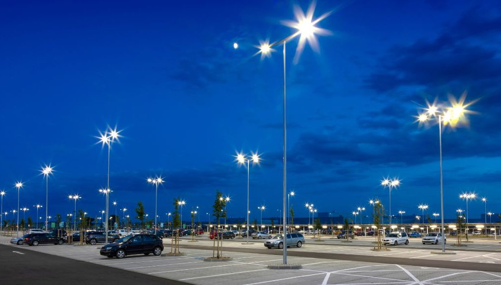 Nearly empty parking lot with LED lights