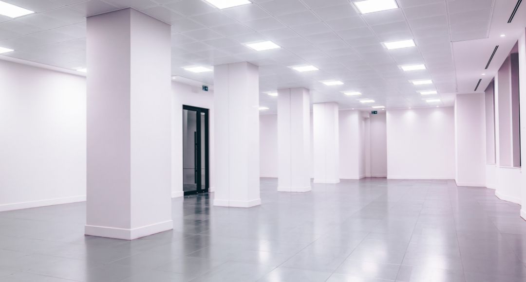 empty office space with white panel lights