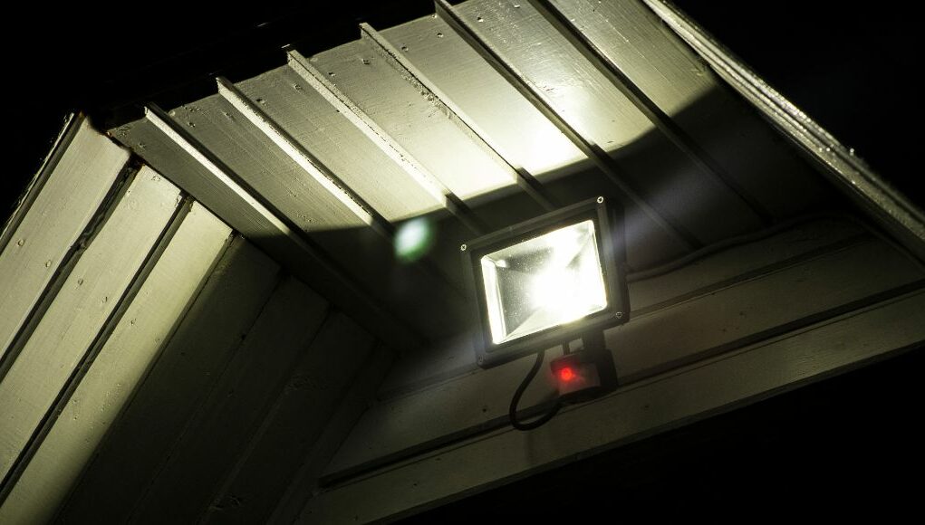 mounted LED flood light on house front