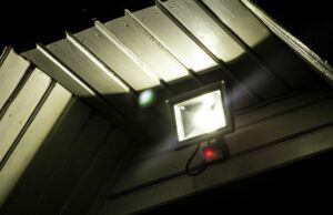 mounted LED flood light on house front