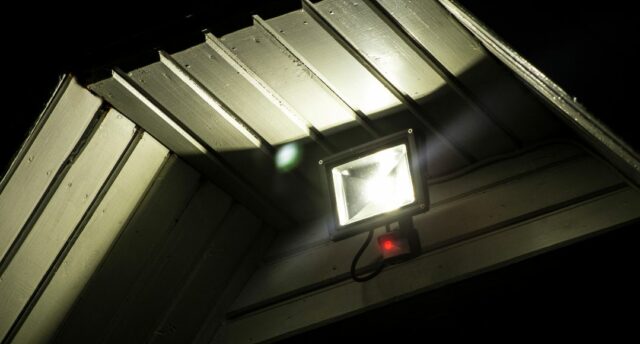 mounted LED flood light on house front