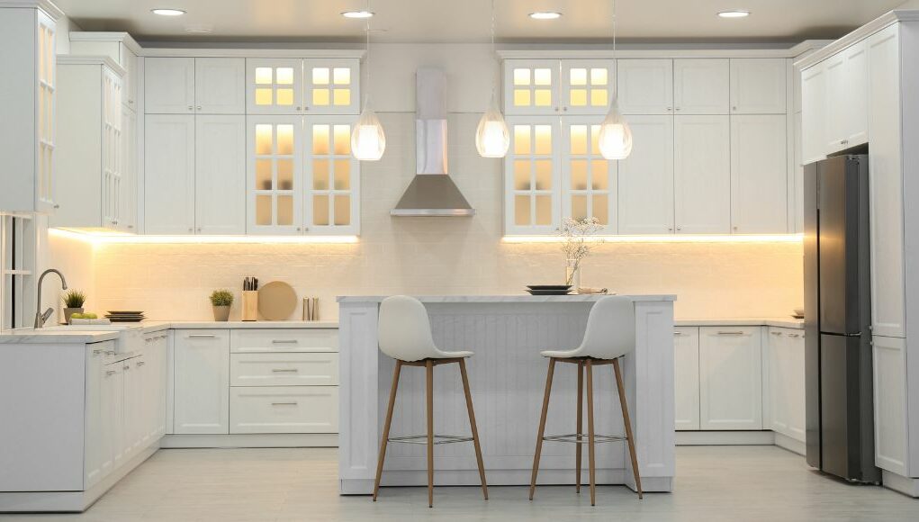 kitchen with wall lights and under cabinet lights