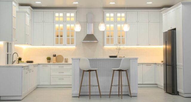 kitchen with wall lights and under cabinet lights