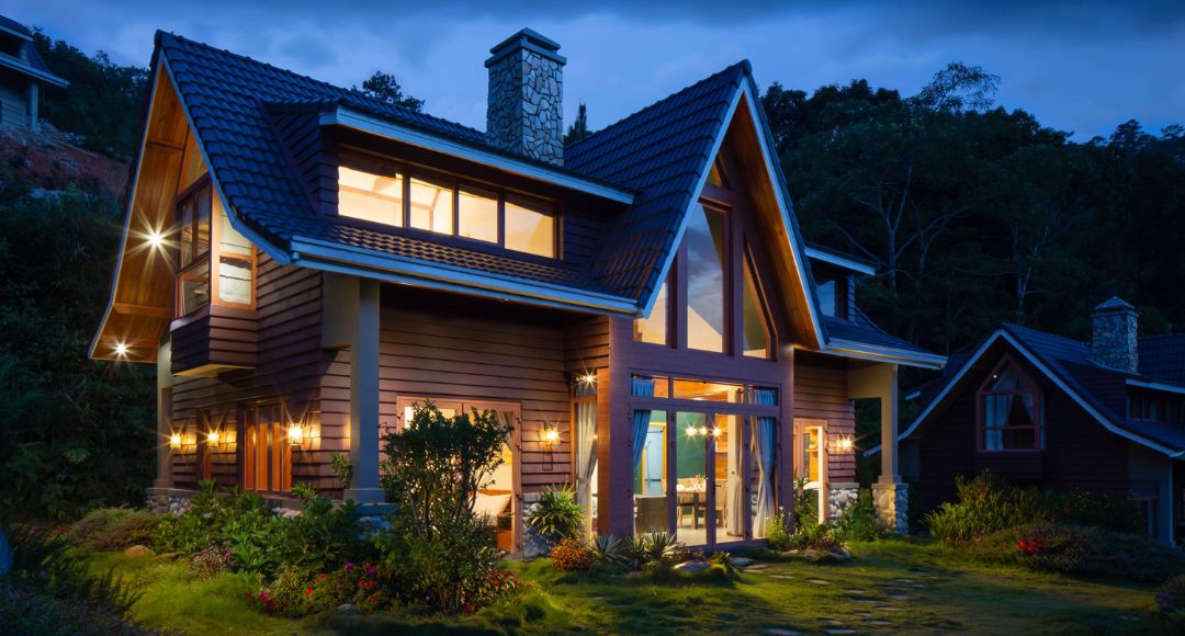 home with exterior lighting