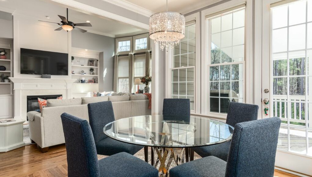 living and dining room with large windows