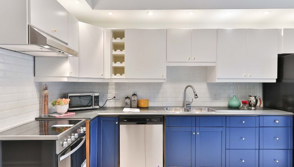 modern kitchen with blue cabinets