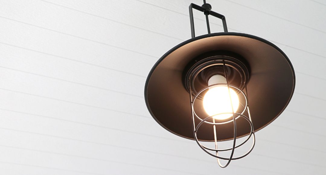 light bulb in an industrial style wall lamp