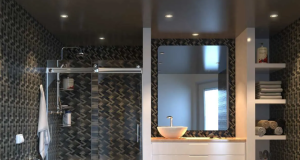 A bathroom illuminated by modern LED downlights.