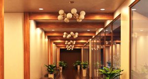 A hallway illuminated by LED downlights.
