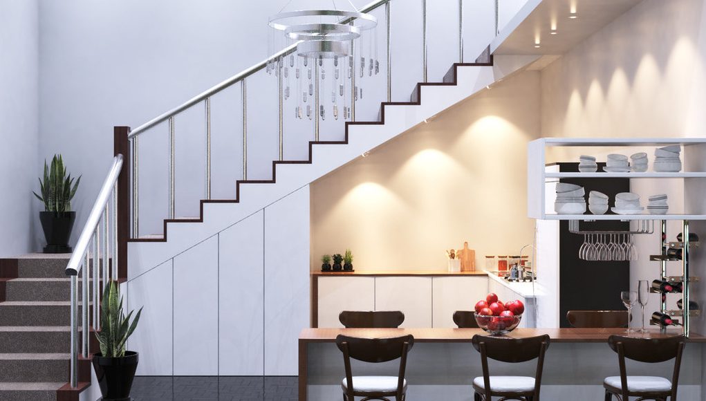 Kitchen illuminated by fire-rated downlights.