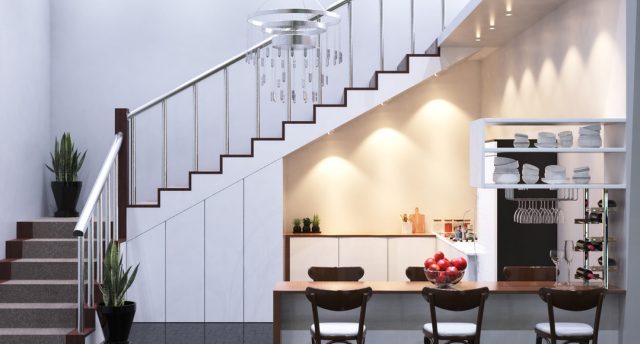 Kitchen illuminated by fire-rated downlights.
