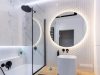 bathroom image with a lighted LED mirror