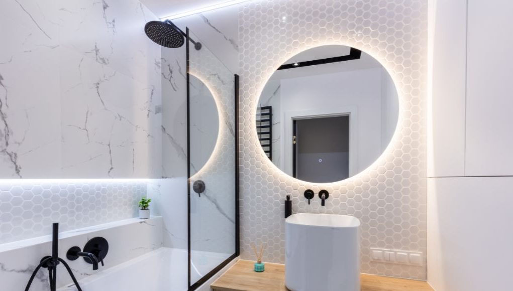 bathroom image with a lighted LED mirror